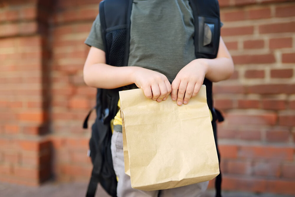 Bagged meals from school staff & volunteers aim to keep kids fed amidst school closures
